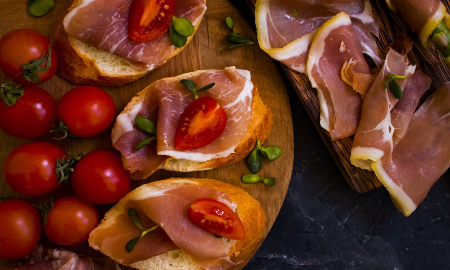 Tomato and jamon iberico de bellota ham slices